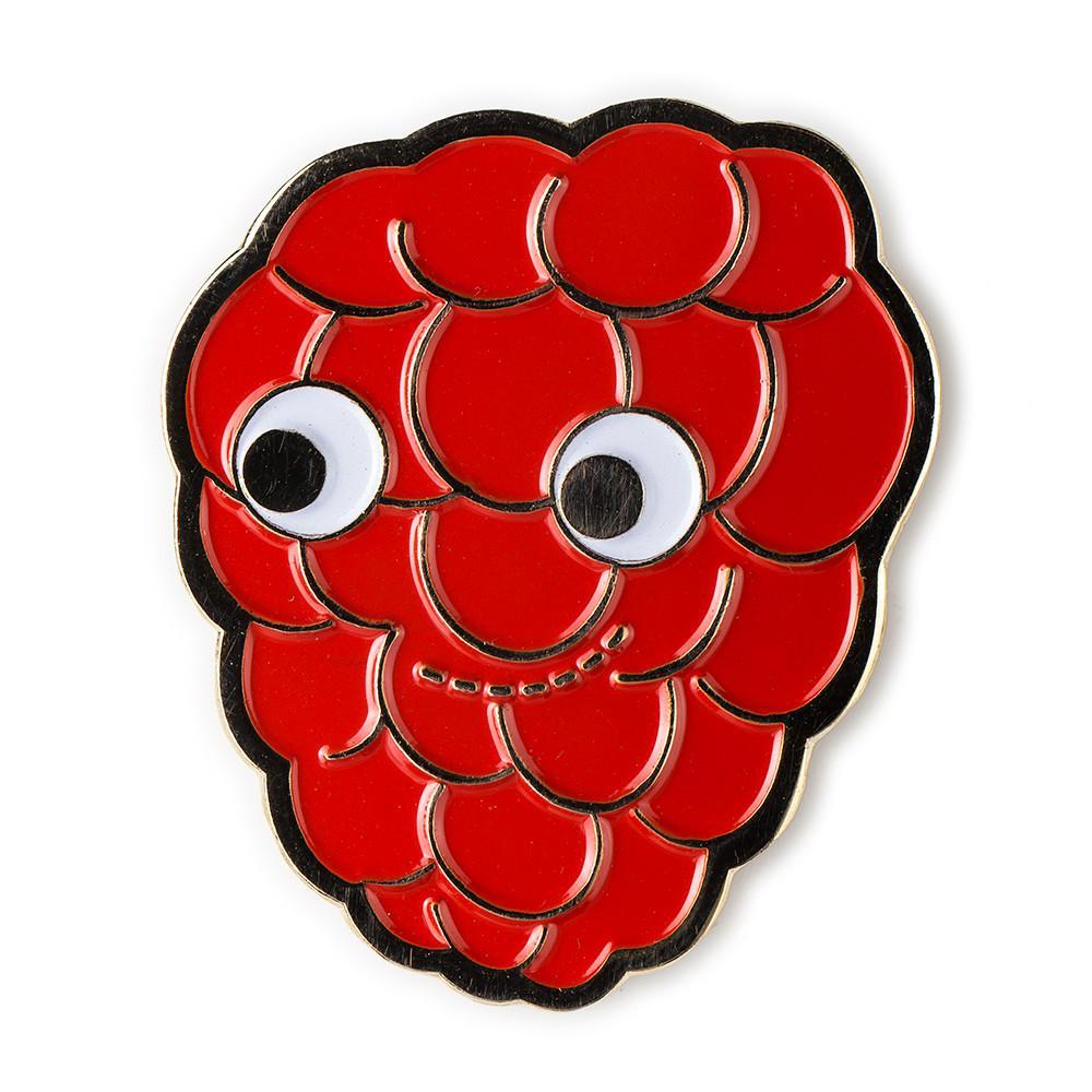 Yummy World collectible mystery enamel pins featuring colorful character designs in a fun, playful style.